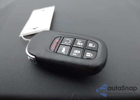 2025 Honda Odyssey Touring from USA, damaged, VIN 5FNRL6H85SB028084